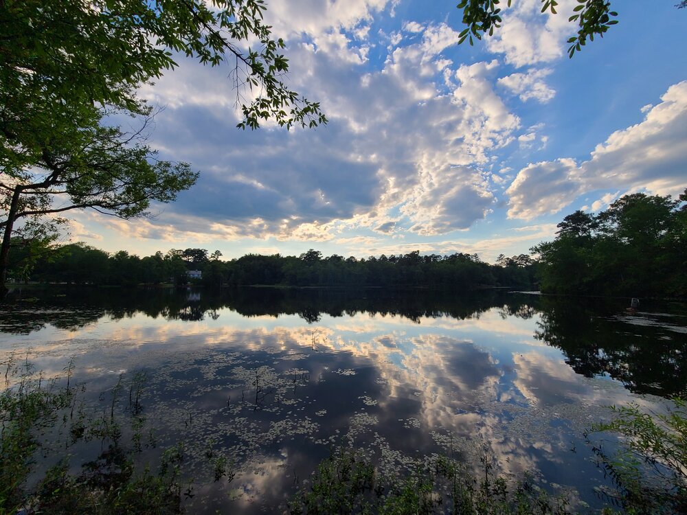 KendallLakeLoop Cloudy sky as the sun s going down over a lake at Kendall Lake Loop